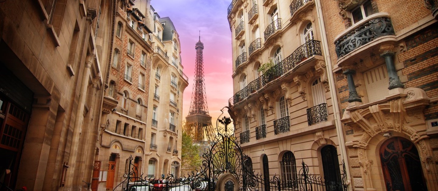 Eiffel Tower view through Paris street